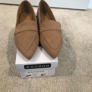 Tan pointed toe flats